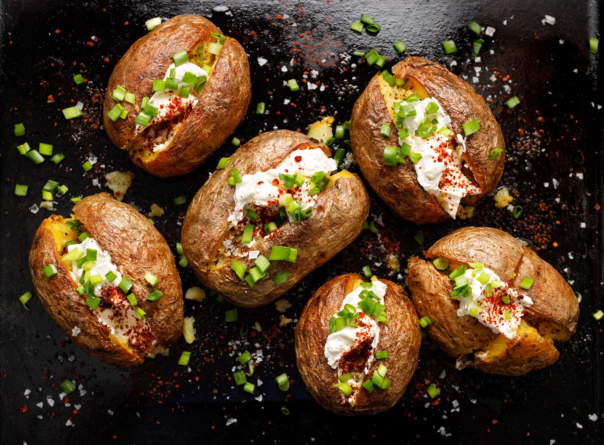 Gepofte aardappel met kruidenkwark