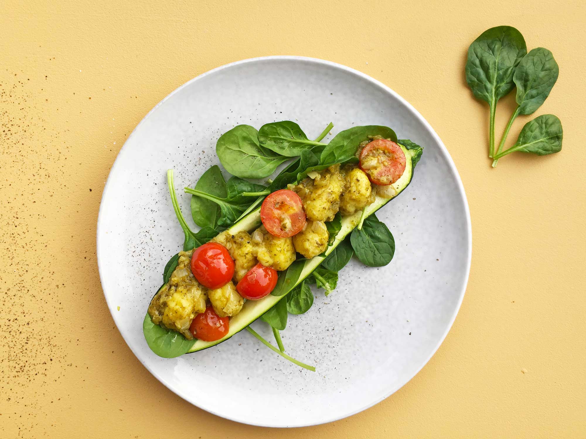 Gevulde courgette met gnocchi en cherrytomaten